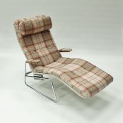 A circa 1970 "Fenix" chrome framed reclining armchair designed by Sam Larsson,