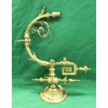 A pair of 19th Century cast gilt brass adjustable wall lights in the rococo taste