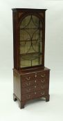 A late George III bachelor's bookcase chest,