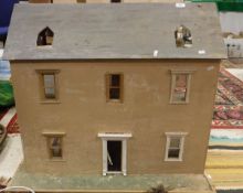 A painted wooden dolls' house,