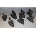 A collection of sixteen various mainly Victorian iron flat irons, various makes,