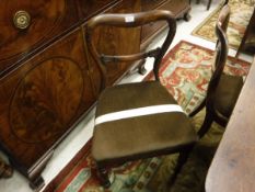 A set of six Victorian rosewood framed kidney back dining chairs