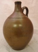 A large 18th Century salt glazed stoneware bellarmine type jug circa 1720