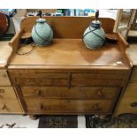 A North Country mahogany dressing chest with two short above two long drawers raised on turned feet