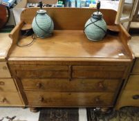 A North Country mahogany dressing chest with two short above two long drawers raised on turned feet