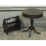 A reproduction mahogany veneered drum table and a reproduction mahogany magazine rack