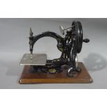 A Wilcox and Gibbs sewing machine company, New York, London, Paris black Japanned,