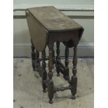 A late 17th/early 18th oak drop leaf supper table with later top,