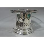 An Edwardian silver plated two handled table spirit burner of circular outline,