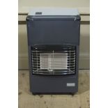 A Supersur portable gas heater in pale and dark grey case