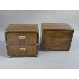 Two side cabinets of similar design, each having two drawers with brass recessed handles,