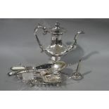 A silver plated coffee pot, crumb scoop, salad servers, stand,