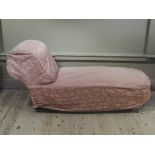 An Edwardian day bed on mahogany square tapered legs,