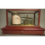 A mahogany cased gilt brass barograph of conventional design, bevelled glass panels,