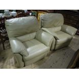 Two putty coloured leather armchairs,