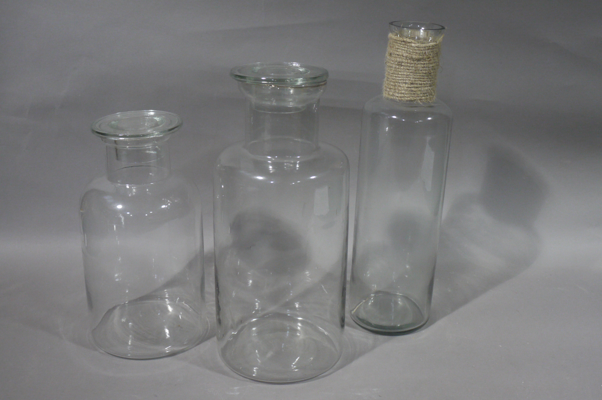 Three glass jars,