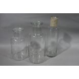 Three glass jars,