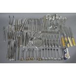 A selection of silver plated and some silver handled cutlery including, marrow scoop,