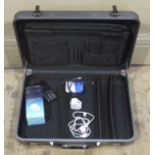 A grey plastic attaché case together with an Alcatel one touch mobile phone (2)