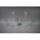 A pair of Royal Doulton cut glass bell shaped decanters