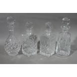 Four cut glass decanters