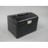 A jewellery case by Esmara in black snakeskin effect covering fitted in grey on three levels