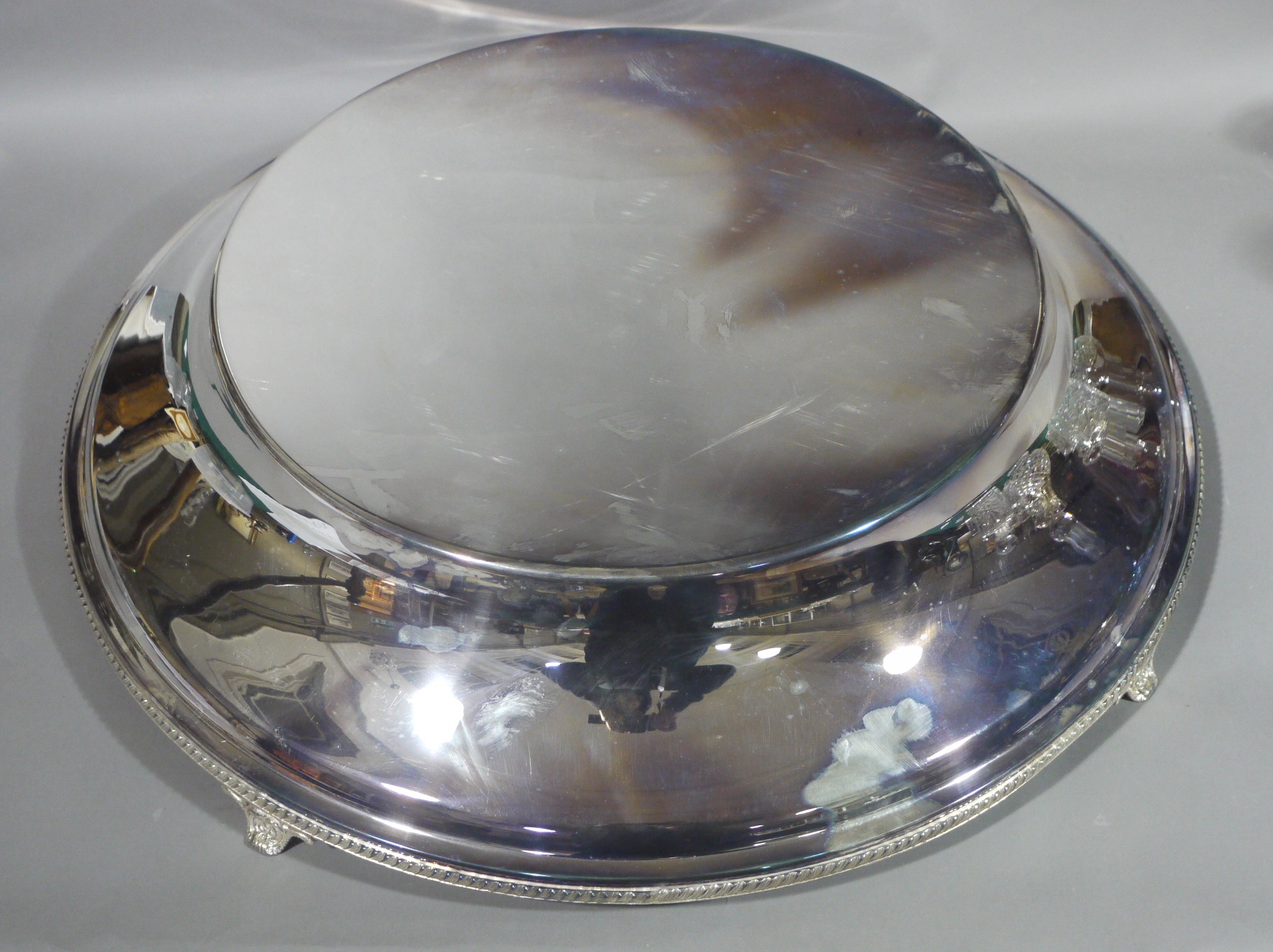 A reproduction silver plated wedding cake stand,