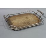 A Victorian two handled mahogany tray with silver plated faux bamboo gallery and handles