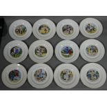 A set of twelve French pottery nursery plates each printed to the centre with a nursery rhyme,