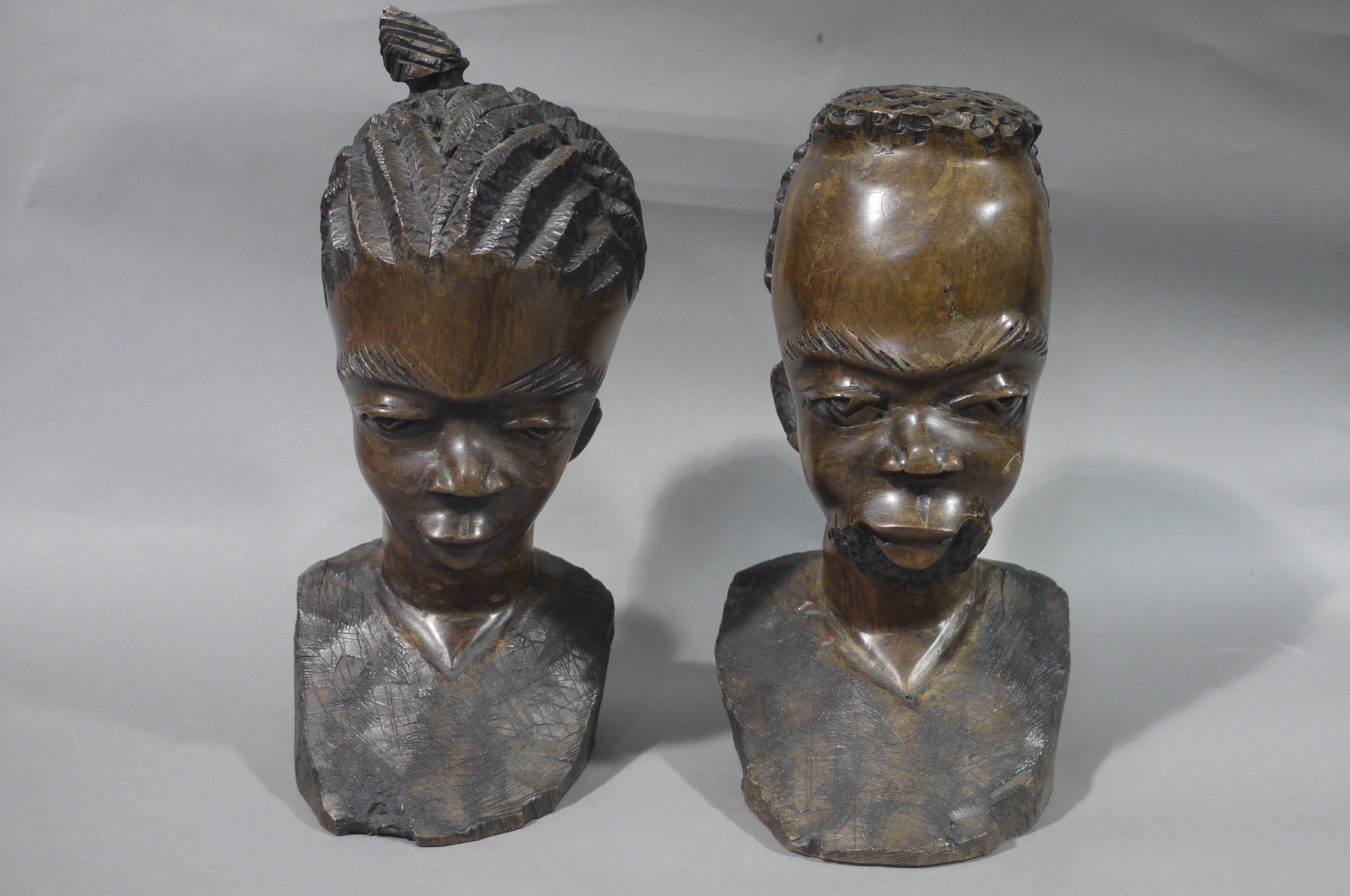 A pair of African carved hardwood tribal busts of male and female, - Image 2 of 2