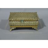 A brass casket, rectangular,