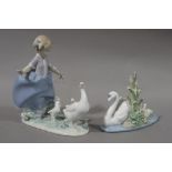 A Lladro figure group of a young girl with ducks and ducklings impressed number 5503, 18.