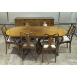 A mahogany finish dining room suite comprising pedestal dining table,