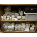 A large quantity of catering ceramics including jam pots, vases, bowls, lidded sugars,