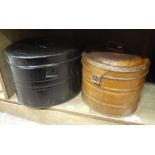 Two oval metal hat boxes