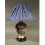 A Chinese style pottery table lamp on pierced carved base with pleated blue shade,