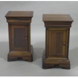 A pair of reproduction French style bedside cupboards,