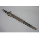 A second World War American bayonet in leather scabbard stamped Lees Ltd 1940,