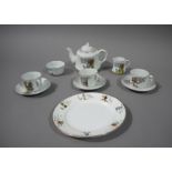 An English pottery nursery service comprising, three cups and saucers, sugar bowl, cream jug,