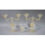 A pair of Murano glass twin branch table candlesticks the stems modelled as stylised swans,