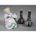 A Continental porcelain jar and cover moulded as an elderly lady having a cup of tea with tray to