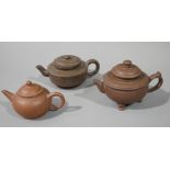 Three Yixing purple clay Chinese tea pots, various sizes,