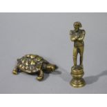 A small cast bronze figure Napoleon; together with a cast bronze model of a tortoise,