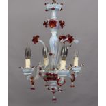 A Venetian opaque and dark red glass four light chandelier