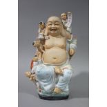 A Chinese porcelain Buddha 'One Hundred Children' figure,