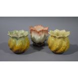 A pair of Leeds pottery spiral moulded leafy small jardinieres or vases,