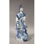 A Chinese blue and white figure of Guan Yin,