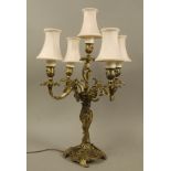 A LATE 18TH CENTURY STYLE BRASS FOUR BRANCH CANDELABRUM in the French taste,