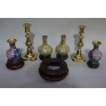 A pair of brass candlesticks together with two pairs of reproduction cloisonne enamel vases and