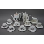 A Susie Cooper Corinthian pattern coffee service comprising six cups and saucers and coffee pot;